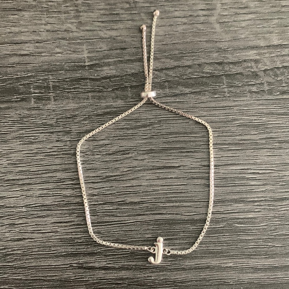 Silver J bracelet